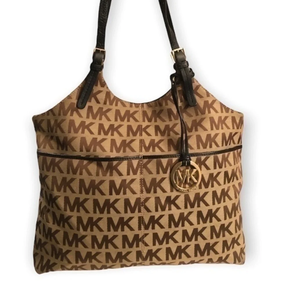 Michael kors brown monogram tote bag with blue leather trim